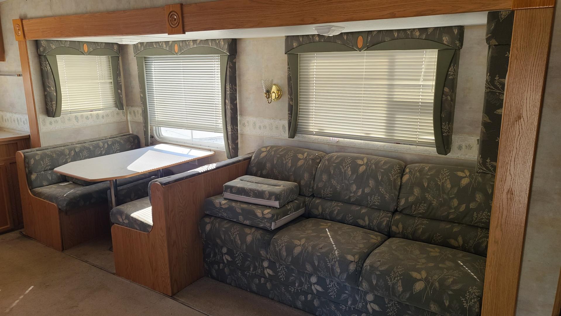 2004 White Jayco Jay Flight 28.5 RKS , located at 923 US HWY 87 E., Billings, MT, 59101, (406) 245-0456, 45.795788, -108.451881 - 2004 Jayco Jay flight 28.5 RKS. 28 1/2 ft fifth wheel with one slide, front queen walk around bed, rear kitchen, rear hitch, A/C, hot water, furnace, booth dinette and Jackknife couch both make into beds, could sleep 6. John at 406-208-0659 - Photo#2