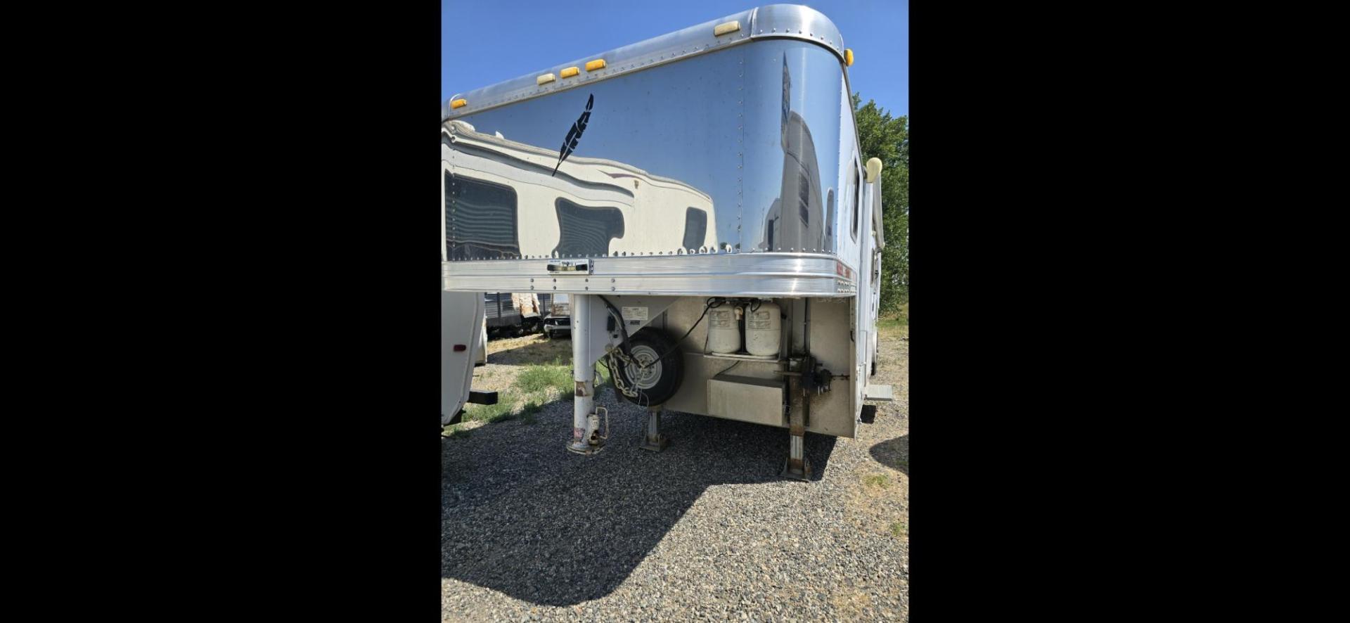 2007 White Feather Lite 3 Horse LQ , located at 923 US HWY 87 E., Billings, MT, 59101, (406) 245-0456, 45.795788, -108.451881 - 1 owner, very nice three horse Living quarters or Toy Hauler, Aluminum on aluminum, tires with less than 5000 miles.Never had a Horse in it, Purchased to use with four wheelers and side by sides, Back is insulated, no slants, Full bath shower toilet, Front queen bed, Couch makes into bed, Could slee - Photo#4