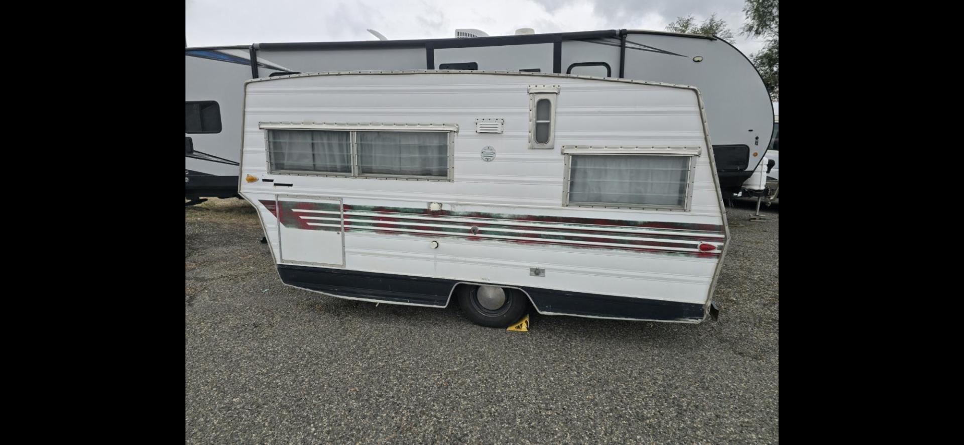 1966 White Aristocrat Lo Liner , located at 923 US HWY 87 E., Billings, MT, 59101, (406) 245-0456, 45.795788, -108.451881 - Cute and immaculate!!! 16 foot and dry weight of 1500 pounds. New tongue trailer brakes And tires. Dual propane tanks and battery, New flooring, Curtains and rods, New three burner propane stove with oven. Table makes into bed. Futon full size mattress. Bunk for small children out of the ceiling. Ne - Photo#4