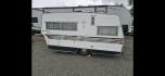 1966 White Aristocrat Lo Liner , located at 923 US HWY 87 E., Billings, MT, 59101, (406) 245-0456, 45.795788, -108.451881 - Cute and immaculate!!! 16 foot and dry weight of 1500 pounds. New tongue trailer brakes And tires. Dual propane tanks and battery, New flooring, Curtains and rods, New three burner propane stove with oven. Table makes into bed. Futon full size mattress. Bunk for small children out of the ceiling. Ne - Photo#4