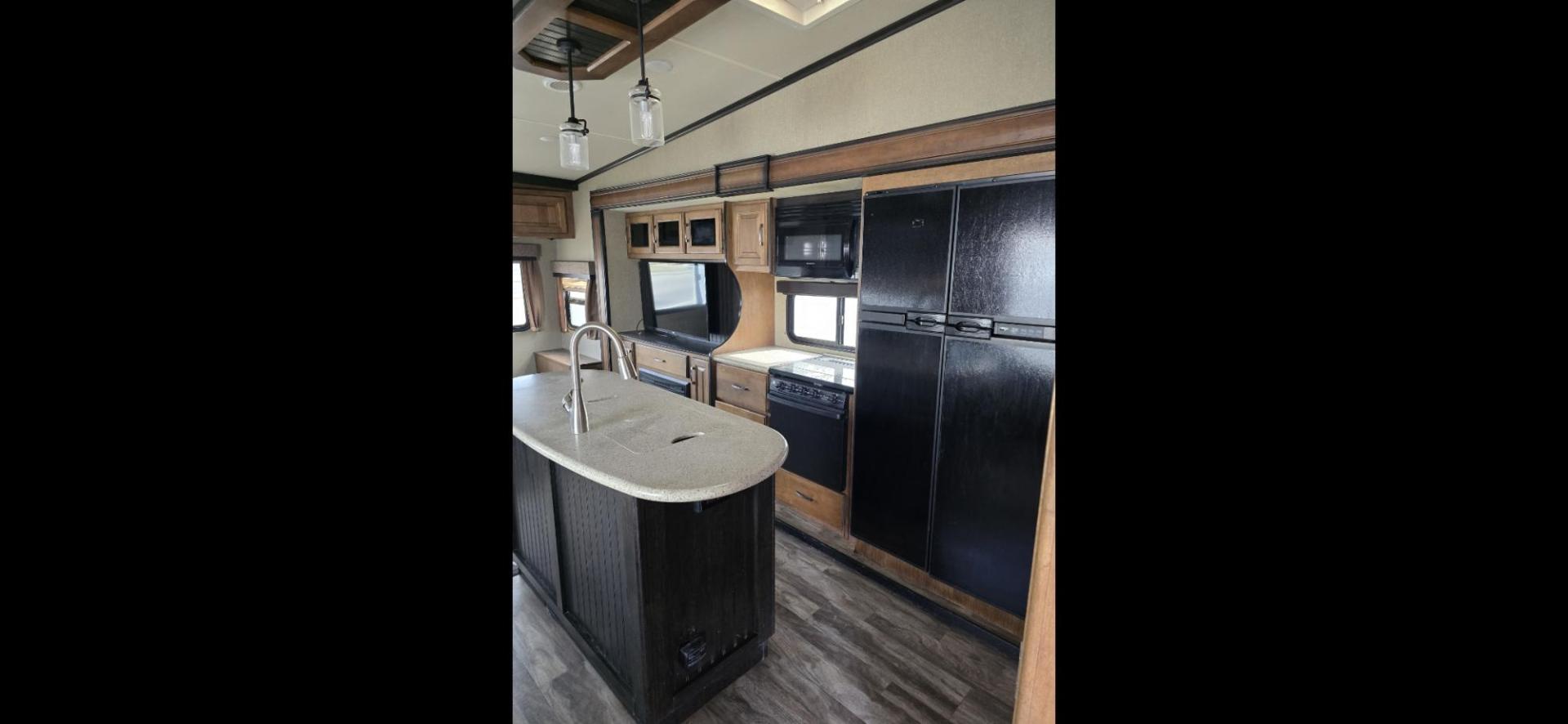 2018 Tan Grand Design Reflection , located at 923 US HWY 87 E., Billings, MT, 59101, (406) 245-0456, 45.795788, -108.451881 - HOME ON WHEELS!! THIS IS A VERY NICE UPSCALE, FIFTH WHEEL. 41' w/4 Slides, dual A/C, two auto awning, washer/dryer hookup, heated enclosed underbelly, four season, rear entertainment center, exterior speakers, four door fridge and freezer, center island, exterior speakers, front queen walk around - Photo#4