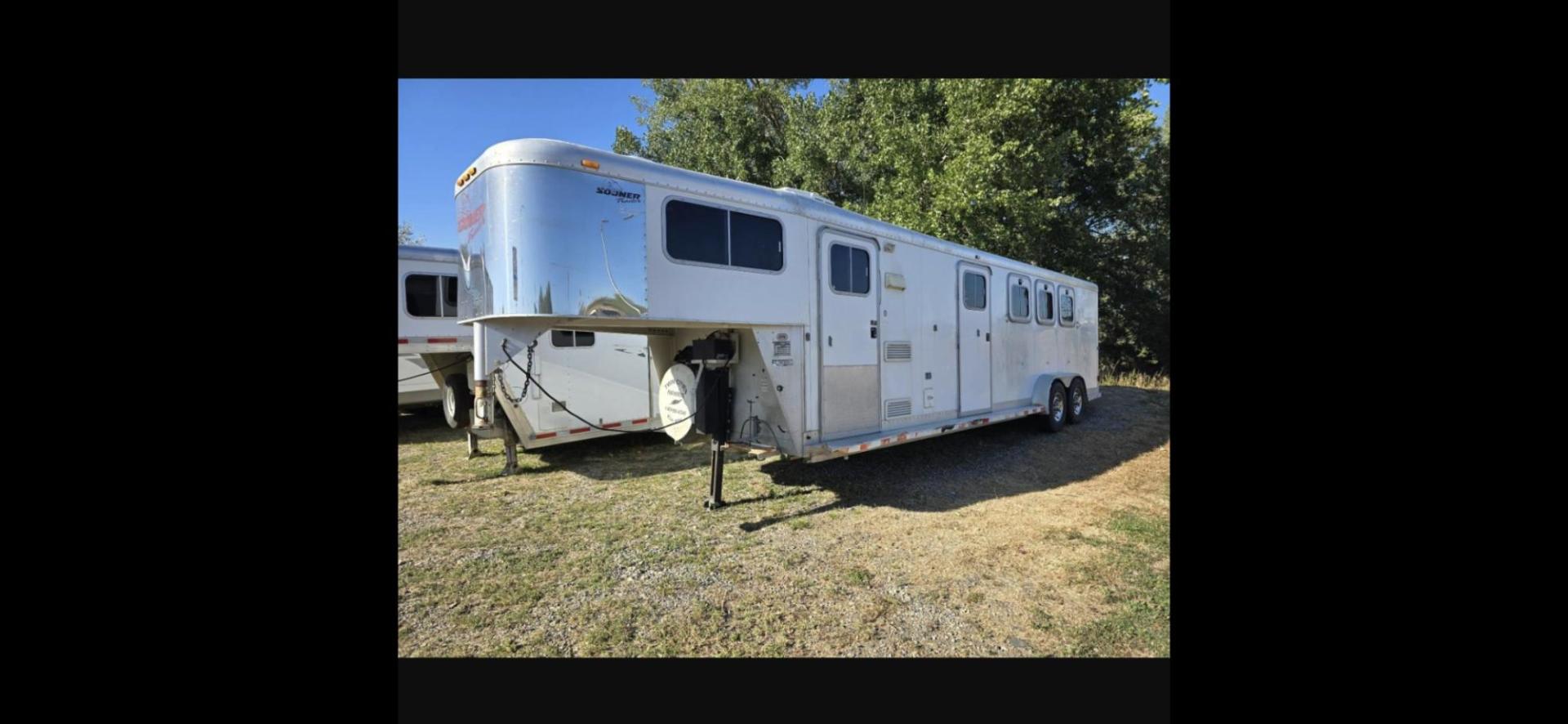 2003 White Sooner 3 Horse LQ , located at 923 US HWY 87 E., Billings, MT, 59101, (406) 245-0456, 45.795788, -108.451881 - Very nice three horse slant, 36' overall length, 7' short wall, Aluminum on aluminum, A/C, Forced air heat, Huge 6' midtack with sink, Rear three horse saddle rack, Tires at 80 percent, Front queen bed, couch makes into a bed, Full bath shower toilet, Light hail. John at 4062080659 - Photo#0