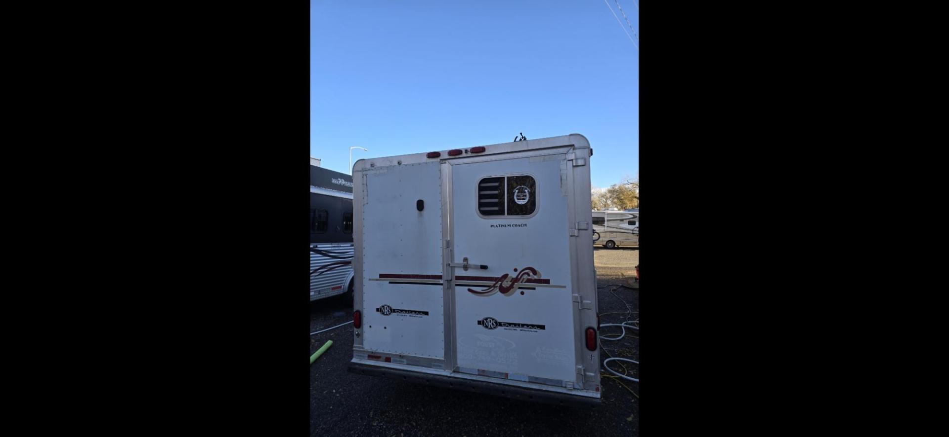 2005 Silver Platinum 4 horse LQ , located at 923 US HWY 87 E., Billings, MT, 59101, (406) 245-0456, 45.795788, -108.451881 - 2005 Platinum Four horse with LQ READY TO RODEO!!!! Fabulous shape and located in Billings MT. 4 horse with 12' LQ, front queen bed, rear double bunks. Walk through door, mangers, huge side tack with fold out pad rack. Aluminum on aluminum. Wired and plumbed for generator.15 gallon fuel tank. Flo - Photo#2