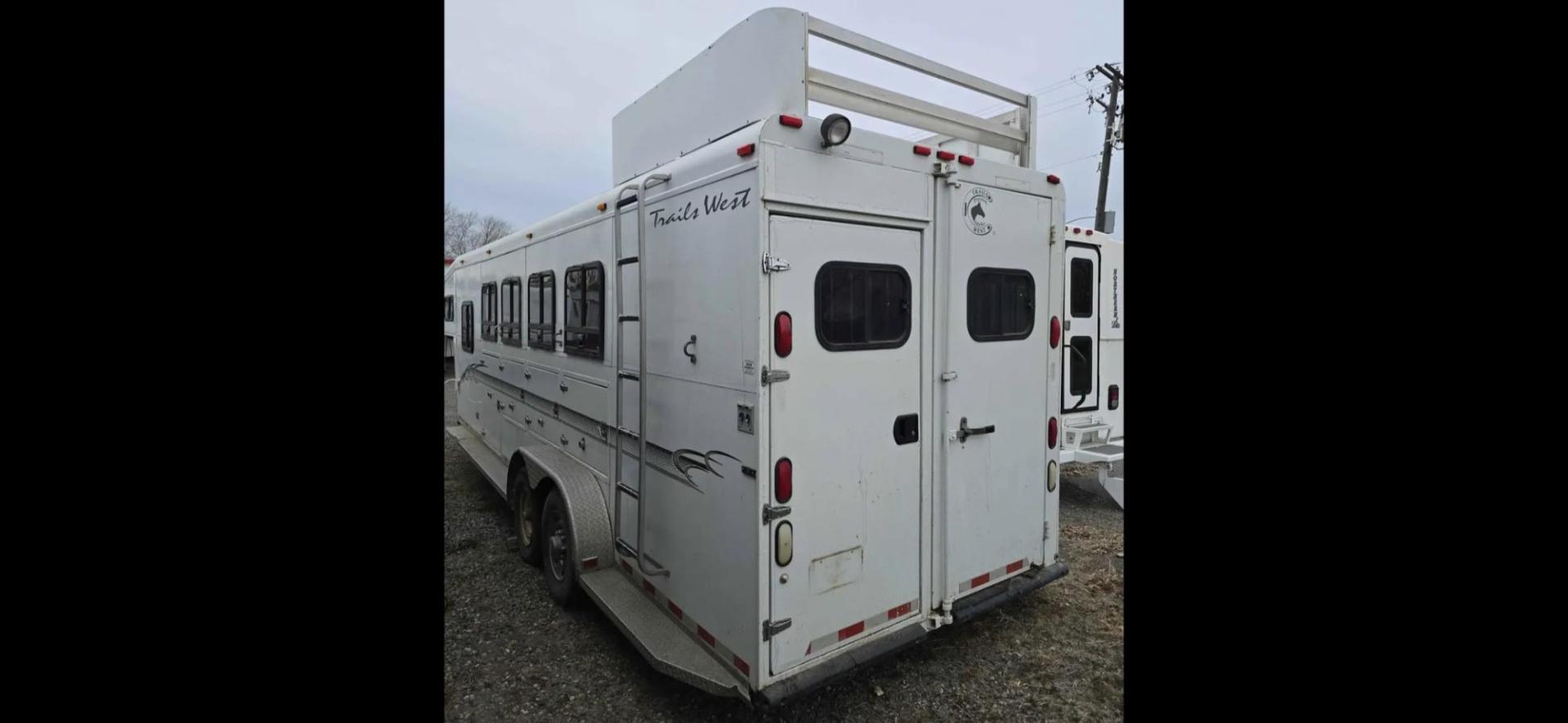 2002 White Trailswest Sierra , located at 923 US HWY 87 E., Billings, MT, 59101, (406) 245-0456, 45.795788, -108.451881 - 2002 Trails West 4 horse slant w/ mangers... front queen bed...Booth dinette makes into a bed...a/c... forced air heat... shower... 6 gallon dsi water heater... hay pod... full awning... storage under mangers... rear fold out tack. Aluminum on steel. Ready to rodeo. WE CERTIFY OUR USED TRAILERS !!! - Photo#2