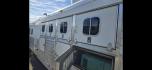 2004 Silver Four Star 4 horse LQ , located at 923 US HWY 87 E., Billings, MT, 59101, (406) 245-0456, 45.795788, -108.451881 - Located in Billings MT $41,900 READY TO RODEO Absolutely Gorgeous 4 horse slant with OUTLAW CONVERSION!!!! 8' wide, front queen bed, two couches that fold down to beds, aluminum on aluminum, mangers, fold down windows on both sides, onan 4000 watt generator, Hay rack, A/C, furnace, hot wate - Photo#3